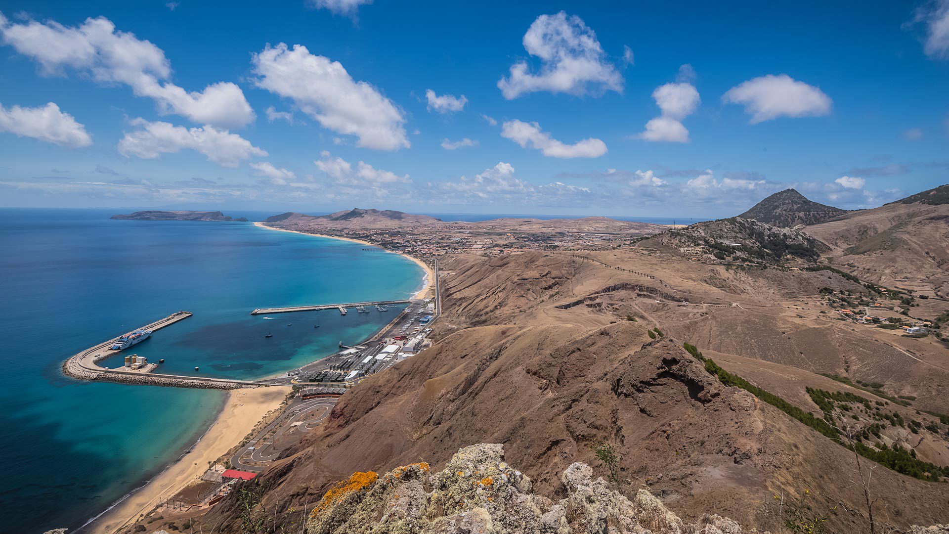 Porto Santo hillside with panoramic view of sea and sand.