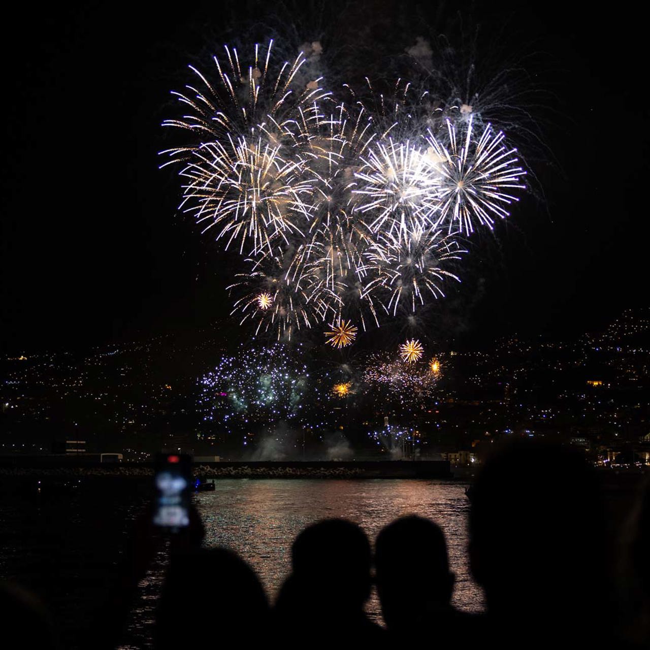 Atlantic Festival in June with fireworks over the sea at night in Madeira.