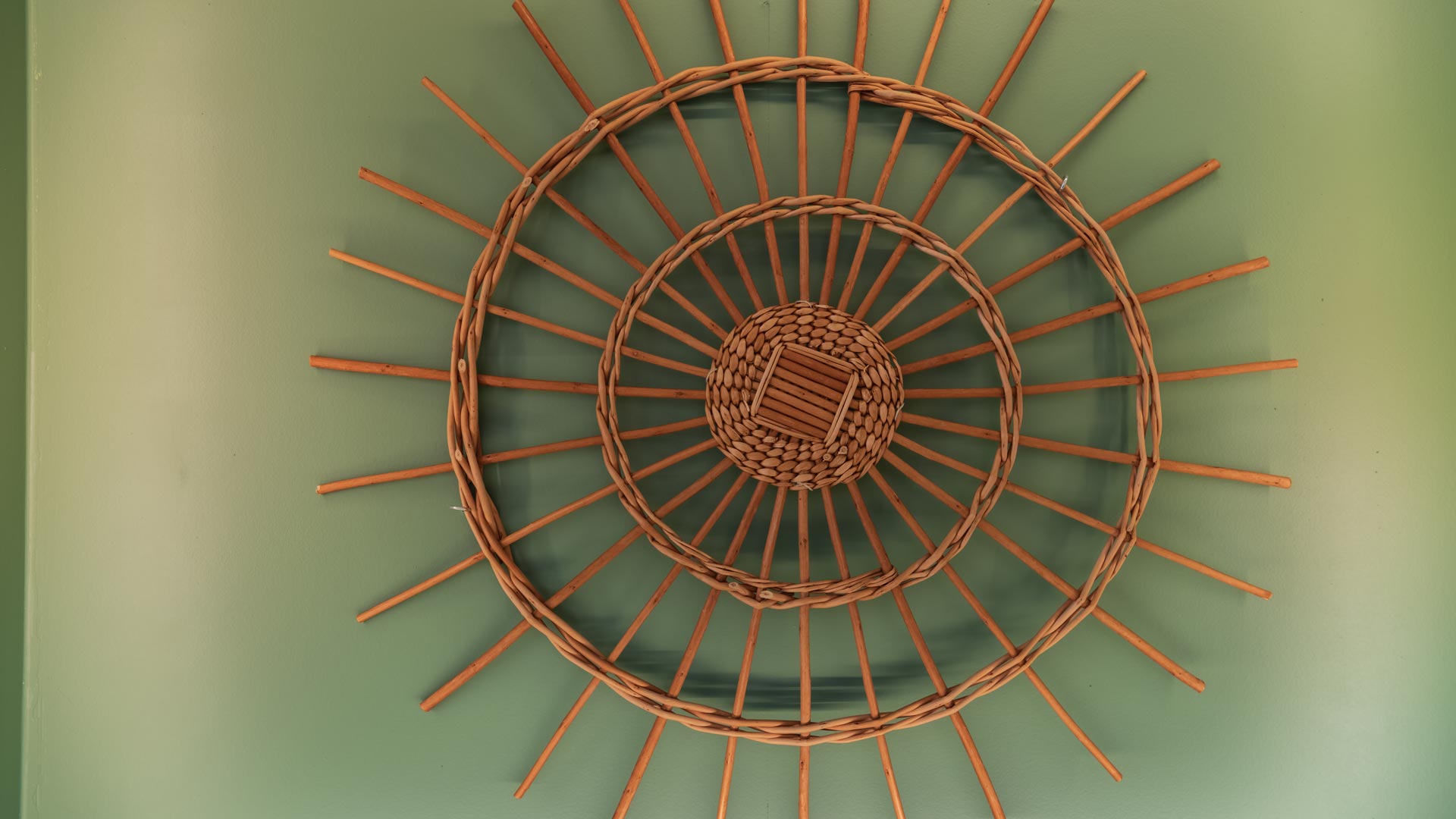 Wicker craft item displayed at the Madeira Tourism Office in Lisbon.