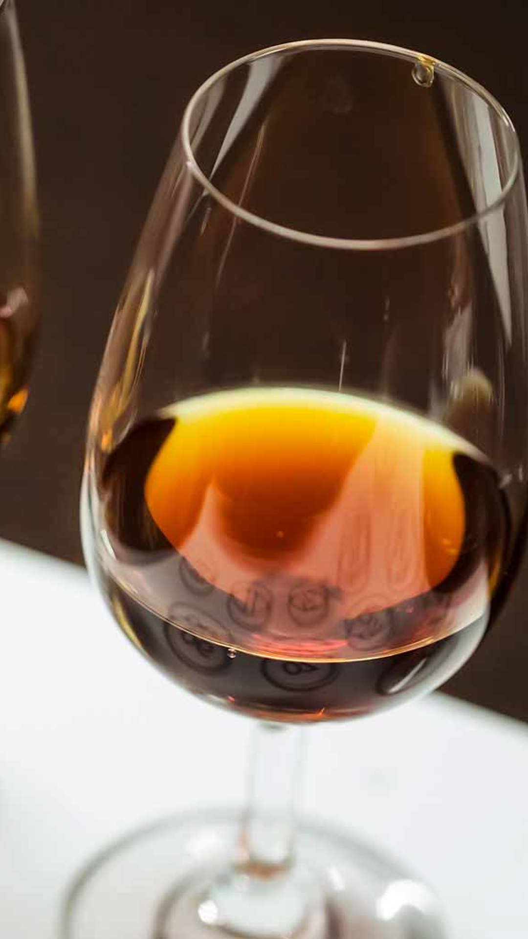 Glasses of Madeira wine on a table.