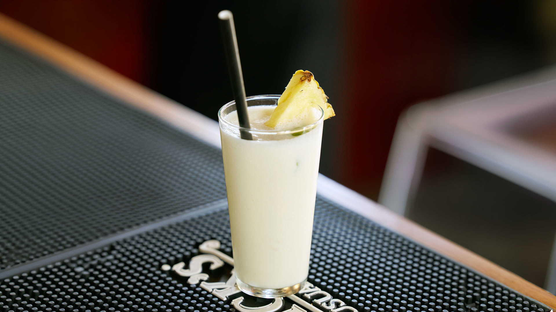 Glass of pineapple nikita served on Madeira Island.