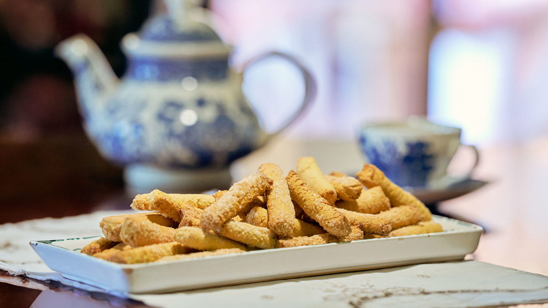 Platter of palitos de cerveja served at the table on Madeira Island.