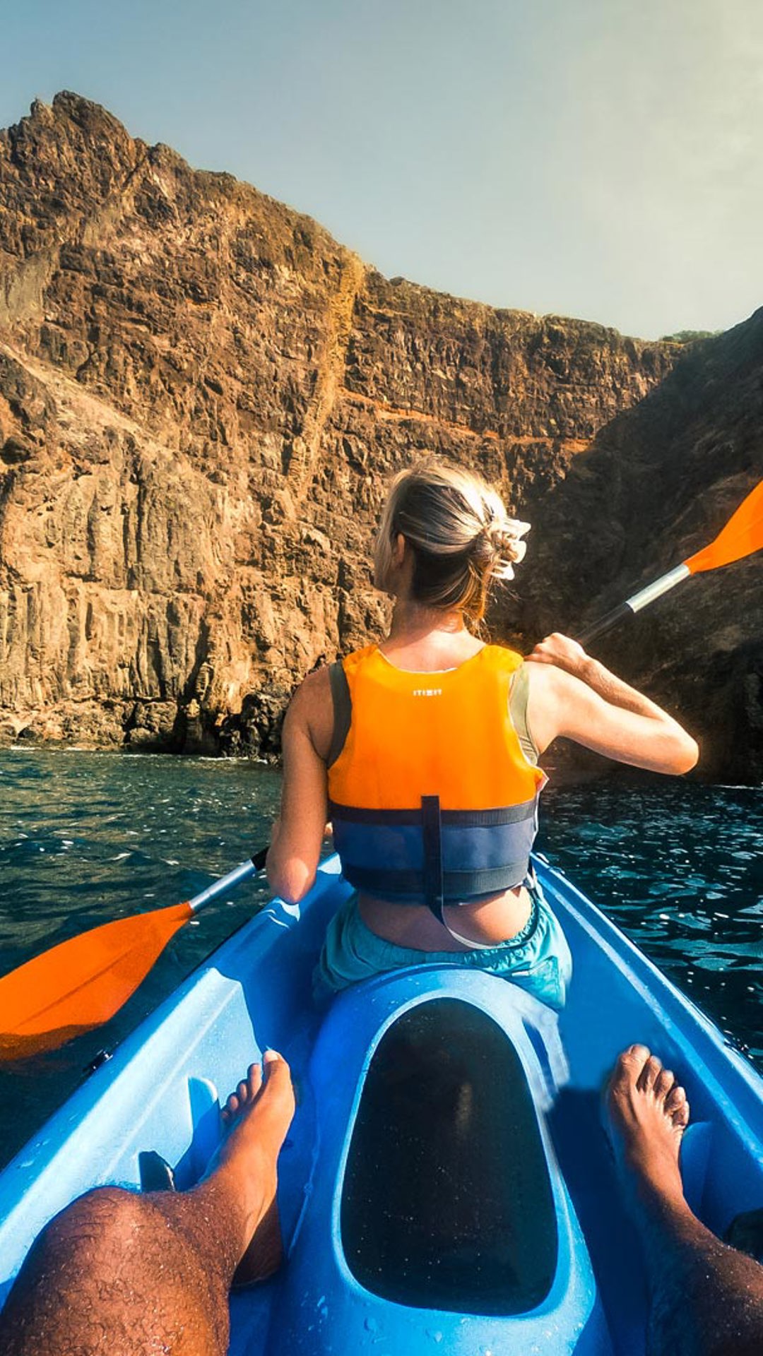 Couple canoeing in the sea along Madeira’s coast.